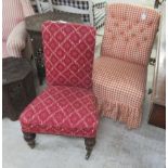 A late Victorian nursing chair with a level back, upholstered in patterned maroon fabric,