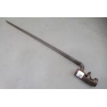 A World War II bayonet, the blade 18"L (Please Note: this lot is subject to the statement made in