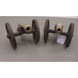 A pair of modern miniature model, cast iron and bronze cannons  4"h
