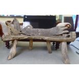 A modern driftwood garden bench seat