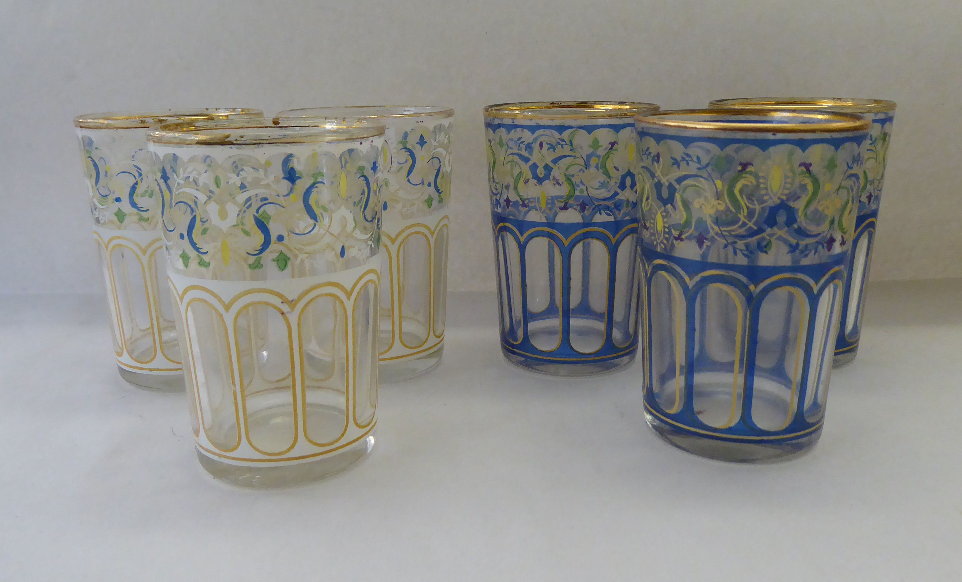Six Venetian inspired glass tumblers, in two different coloured patterns