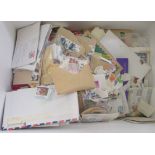 An extensive uncollated collection of used postage stamps: to include Caribbean Island issues and