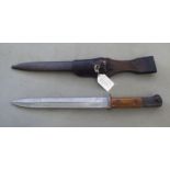 A German Great War Walton & Co bayonet, stamped 10.J.P, the blade 10"L (Please Note: this lot is
