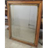 A late 19thC mirror, the plate set in a moulded, simulated maple frame  28" x 35"