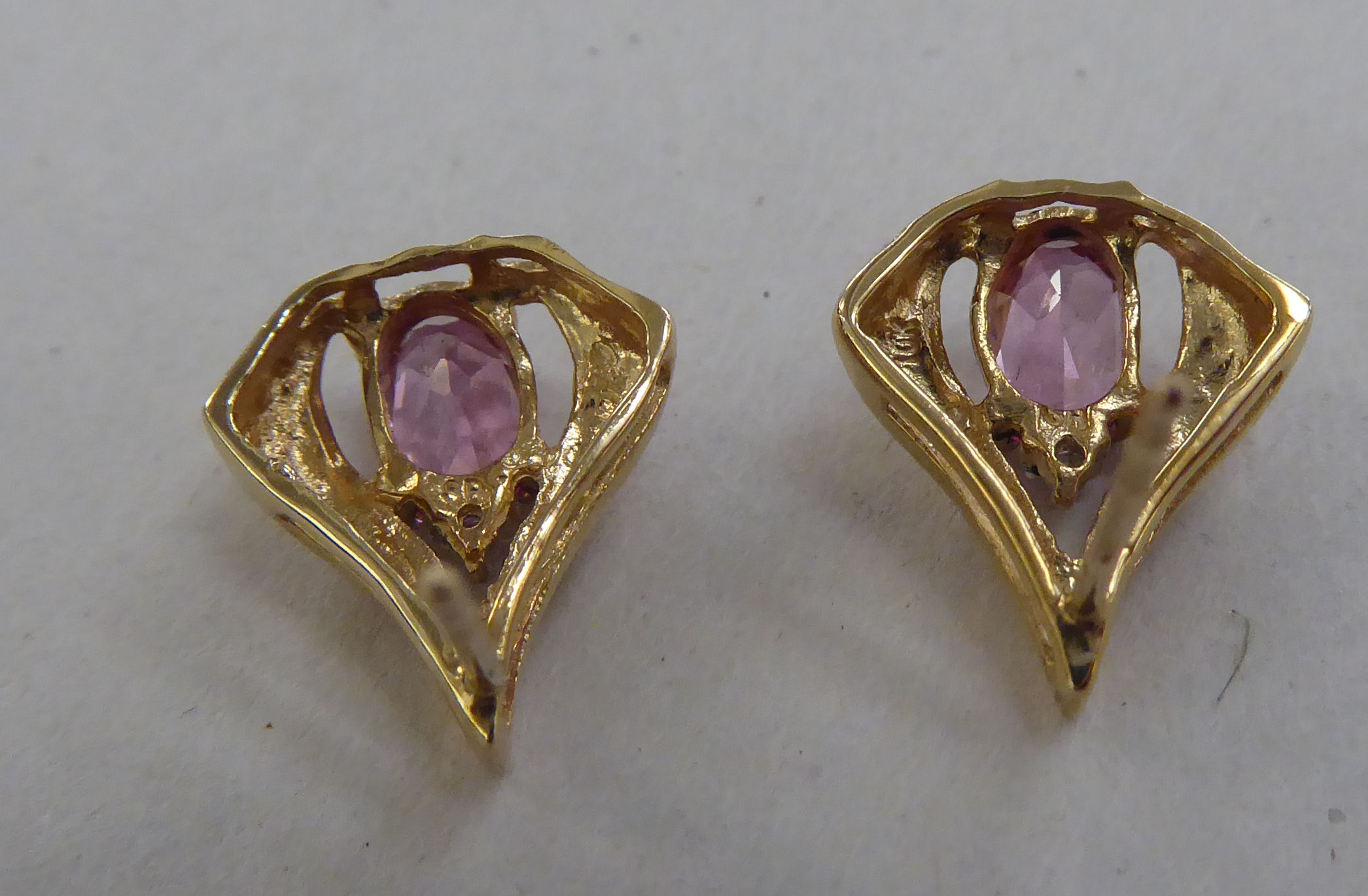 A pair of 10k gold earrings, each set with a pink stone and a diamond - Image 2 of 3