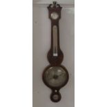 An early 19thC satinwood inlaid mahogany cased wheel barometer with a thermometer and a silvered