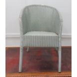 A Lloyd Loom blue painted tub design conservatory chair, raised on splayed legs