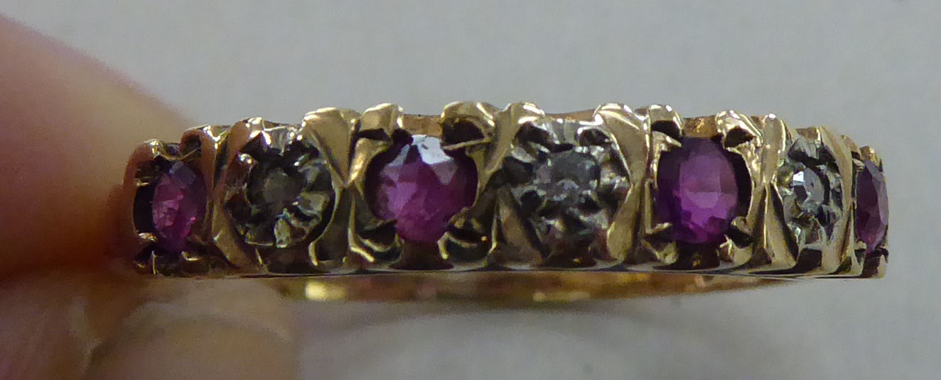 A 9ct gold eternity ring, set with alternating rubies and diamonds - Image 5 of 5