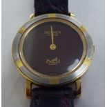 A lady's gold plated, stainless steel cased Hermes of Paris wristwatch, the quartz movement faced by