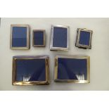 Six various silver photograph frames, on blue fabric backs and easel stands  mixed marks  largest 9"