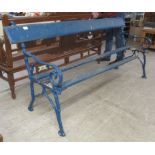 A late Victorian blue painted cast iron garden bench with a slatted wooden back and seat  67"w