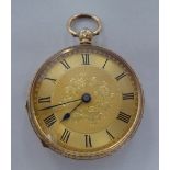 A gold coloured metal fob watch, faced by a Roman dial   stamped 14k