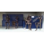 A series of four Bronzart bronze sculptures of musicians   largest 9"h  boxed