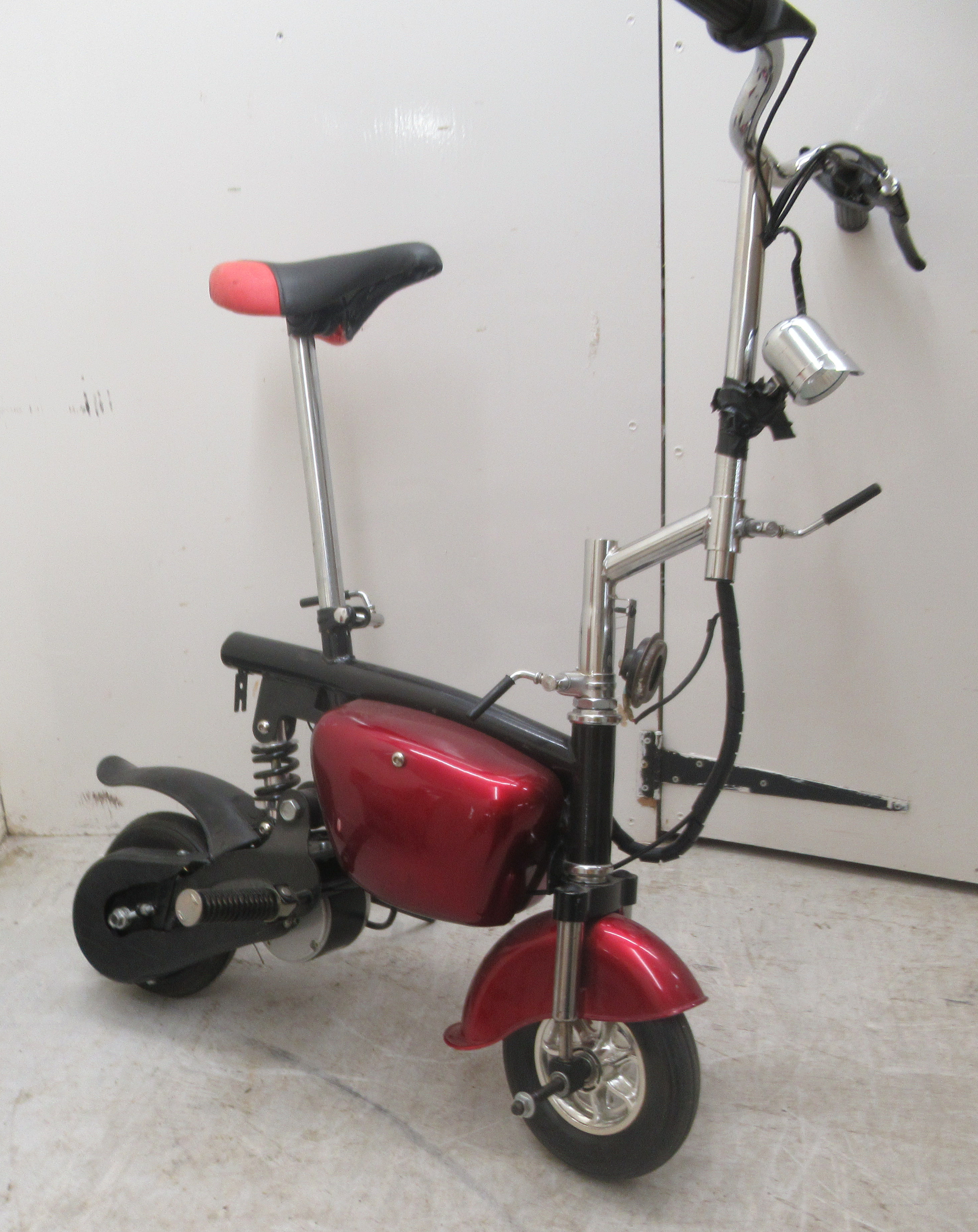A modern battery powered bicycle with red livery and 8"wheels - Image 5 of 5
