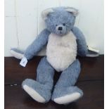 An Olde Friend Bear Co, blue and white covered Teddy bear with mobile limbs  20"h