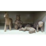 Four vintage carved wooden papier mache moulds, viz. a prancing horse, a squirrel, a pig and a fawn