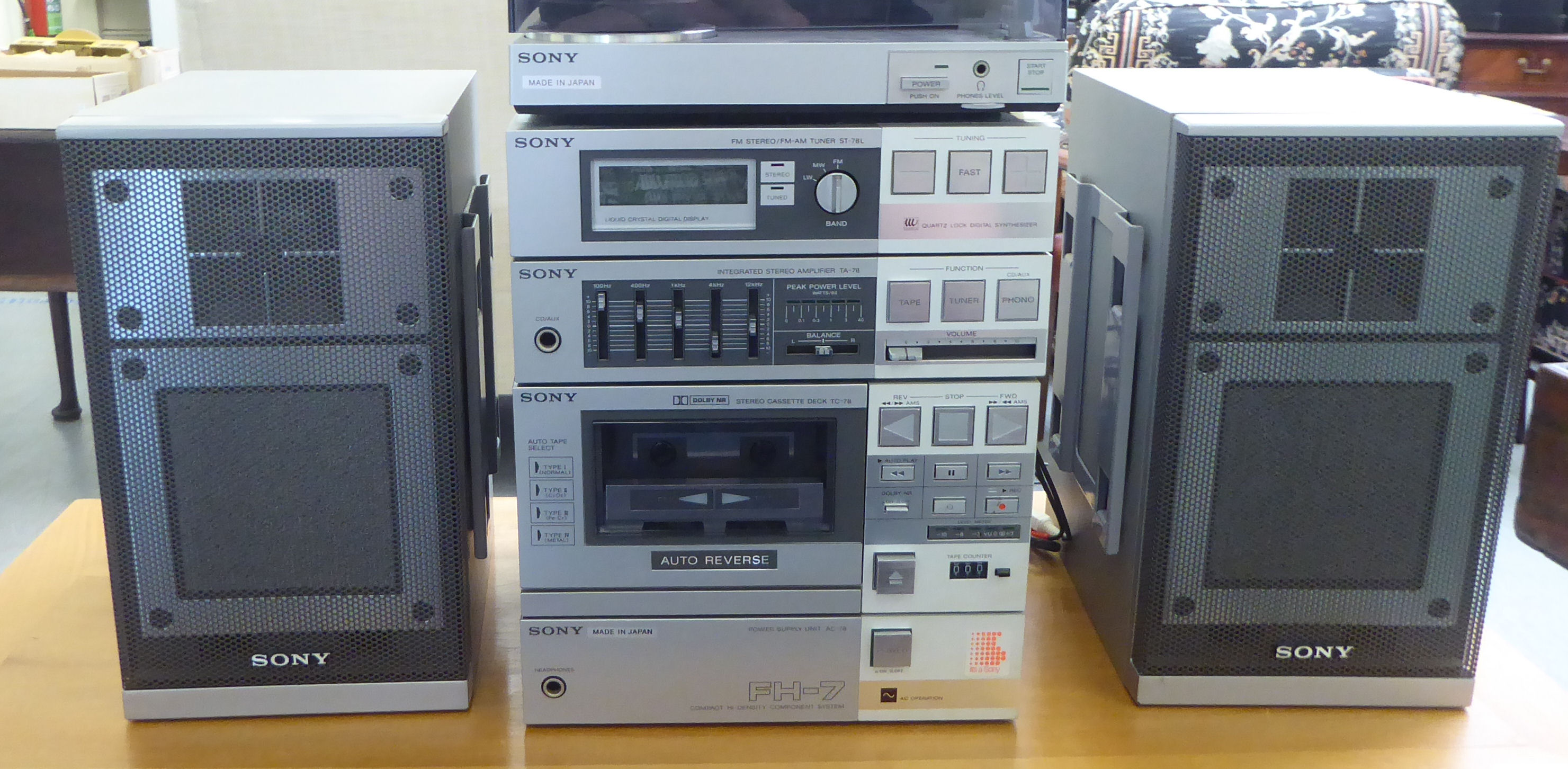 A Sony stacking stereo system and a pair of matching spears