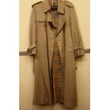 A gentleman's Burberry's three-quarter length raincoat