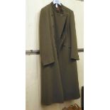 A gentleman's Giorgio Armani three-quarter length jacket, inspired by military uniform