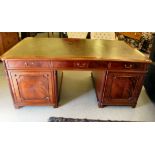 A modern (probably Bright's of Nettlebed) period style, mahogany partners' desk, the top set with