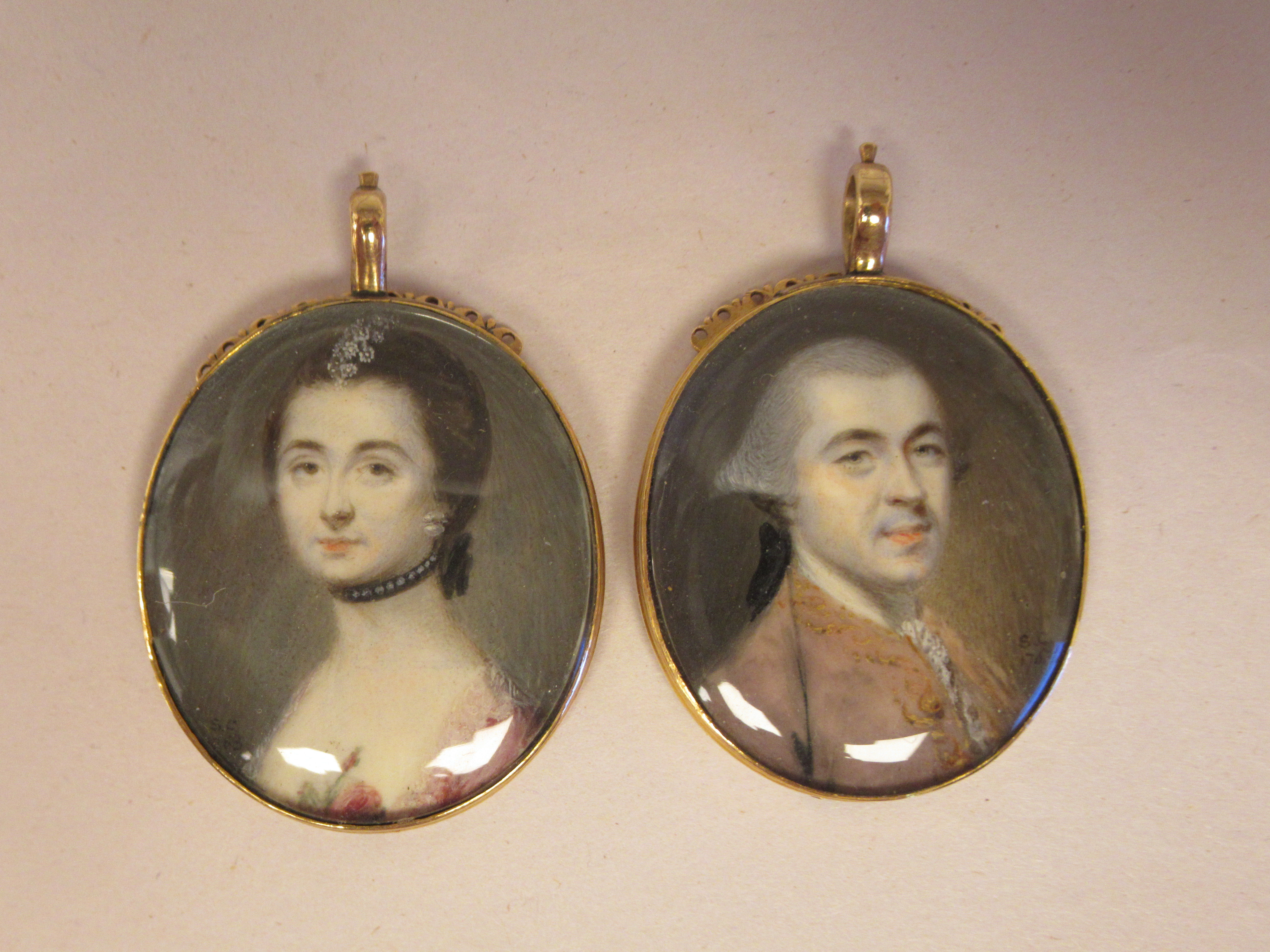 A pair of 18thC oval, head and shoulders portrait miniatures, featuring James Laird and Letitia