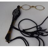 Art Nouveau period tortoiseshell and gilt metal lorgnettes with picquetworked, ribbon tied, whiplash