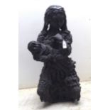 Attributed to William Fisher - a kneeling Virgin & Child, charcoal coloured terracotta statue  25"h