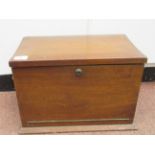 An early 20thC mahogany desktop stationery box with straight sides, a lockable, hinged lid, fall