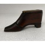 A 19thC treen carved wooden novelty snuff box, fashioned as a studded ankle boot with a hinged lid