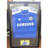 An Ashley Cole Chelsea Football Club shirt, bears a personalised handwritten greeting and signature,