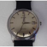 An Omega stainless steel cased wristwatch, the movement with sweeping seconds, faced by a silvered