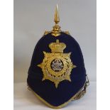 An Officer's Home Service pattern Manchester Regiment helmet with liner and chinstrap  (Please Note: