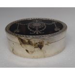 An Edwardian silver fabric lined ring box with a piquetworked tortoiseshell panel to the lid, ribbon