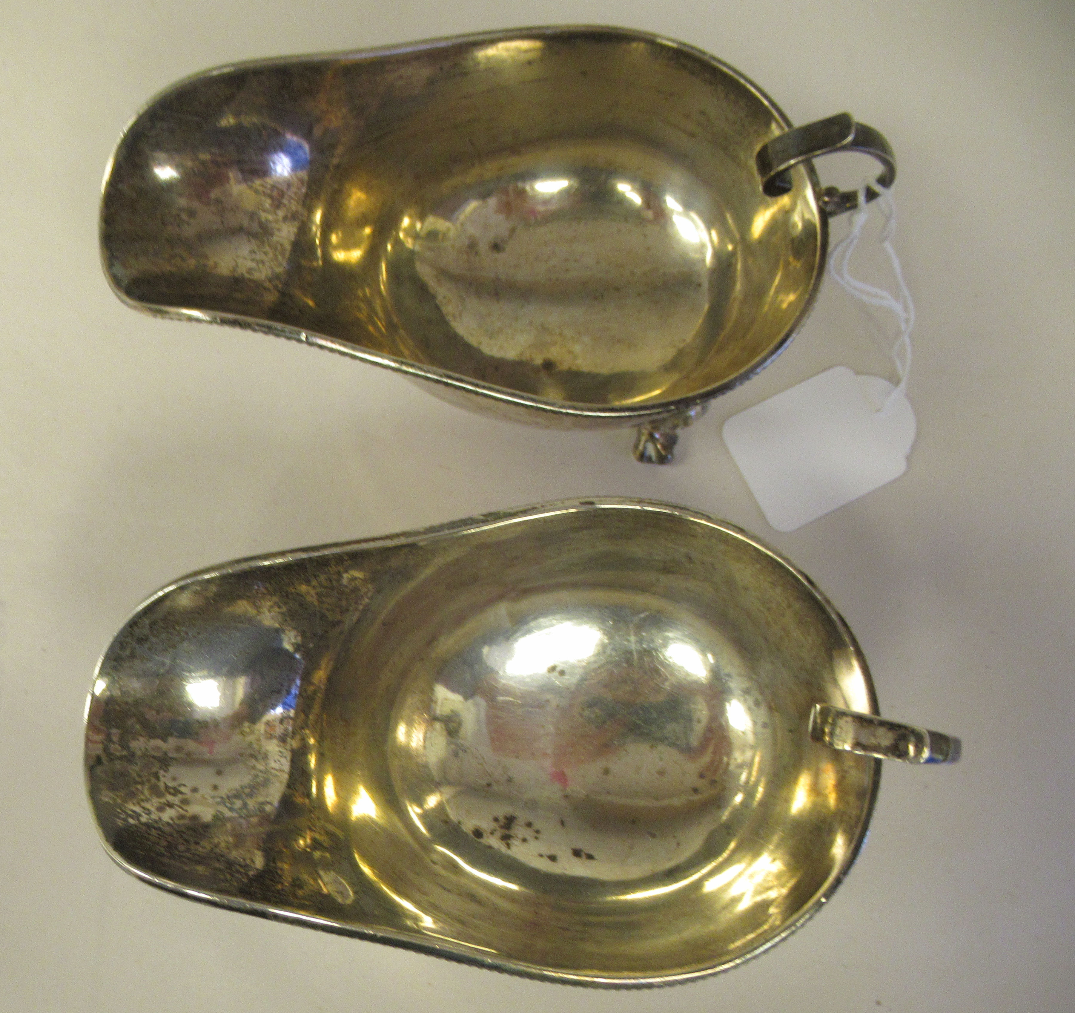 A pair of silver sauce boats with bead borders and C-scrolled handles, elevated on cast paw feet - Image 5 of 7