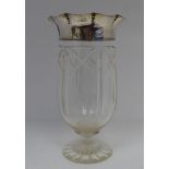 An Edwardian cut glass pedestal vase with an applied silver and wavy edged rim  George Nathan &