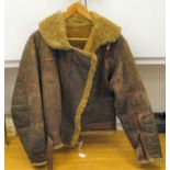 A vintage zipped and belted brown hide, sheepskin lined pilot's jacket (approx. size 40m chest) (