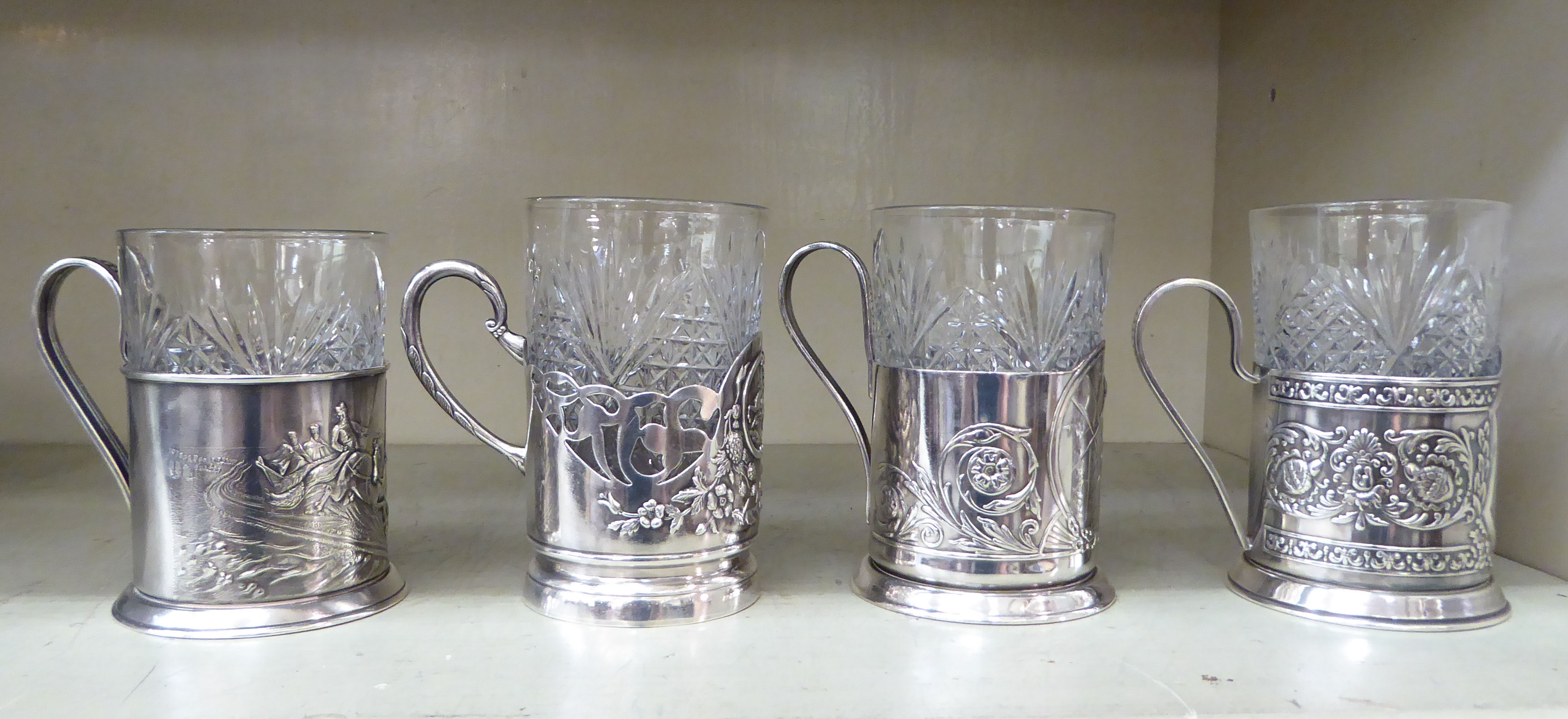 Four Russian moulded glass breakers, in matched white metal frames with loop handles - Image 3 of 3