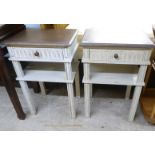 A pair of modern shabby chic painted (probably pine) single drawer bedside tables, raised on