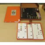 Two dissimilar cased Mah-Jongg sets with resin tiles