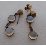 A pair of 9ct gold moonstone set pendant earrings