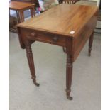 A William IV mahogany Pembroke table with an end drawer and facsimile on the reverse, raised on reed