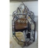 A 20thC Venetian inspired multi-panelled mirror on board  36" x 21"