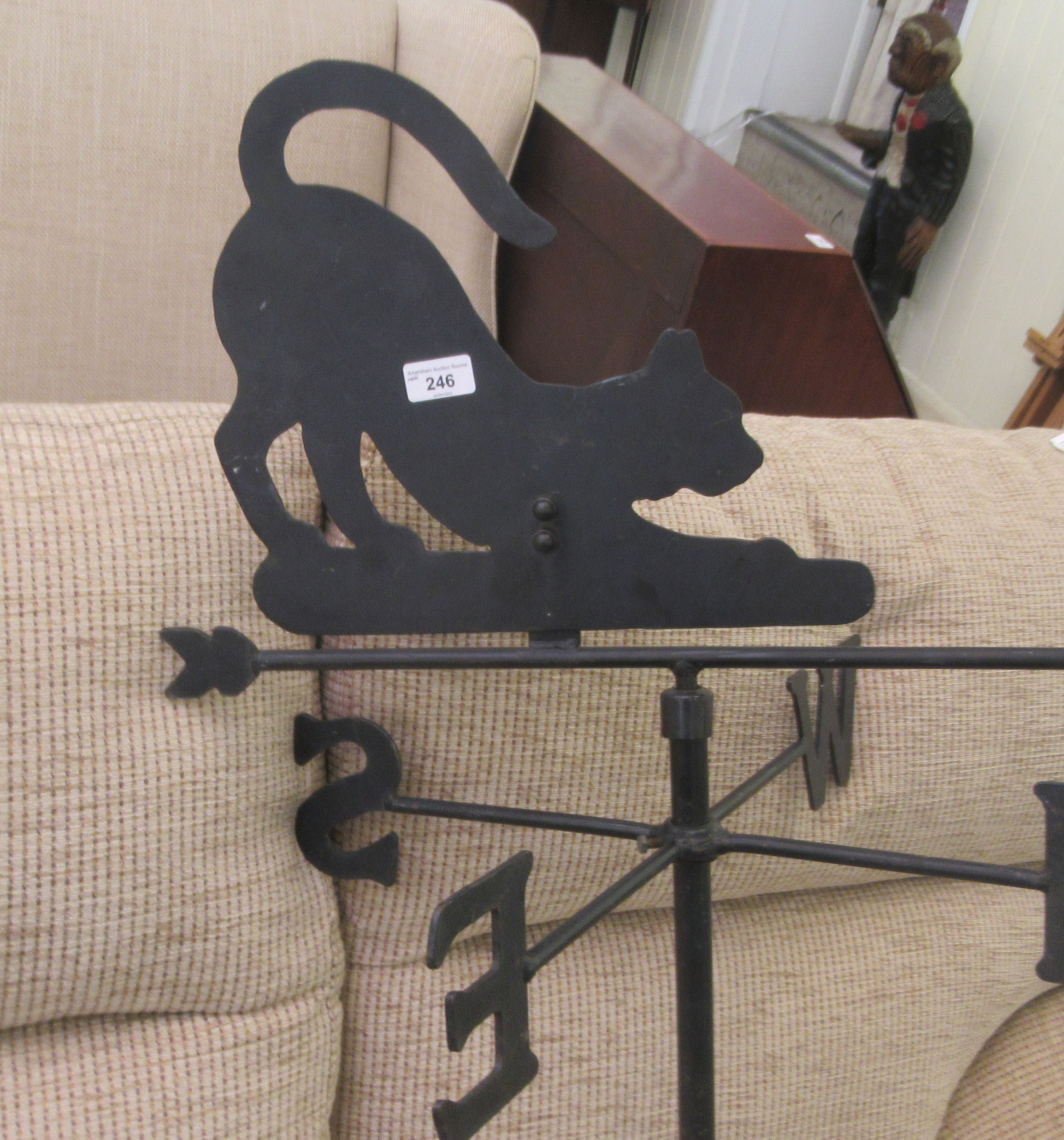 A modern black painted wrought iron weather vane, surmounted by a crouching cat, rotating on a - Image 2 of 2