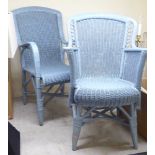 A matched pair of mid 20thC pale blue painted Lloyd Loom style terrace chairs