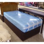 A single mattress and base with a cane bound headboard  36"w