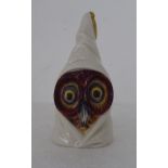 A Royal Worcester china novelty candle extinguisher, fashioned as a hooded owl