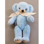 A Merrythought Cheekie bear, in pale blue plush with mobile limbs  12"h