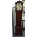 A modern mahogany longcase clock, the arched hood over a straight trunk, on a box base and bracket