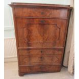 A 19thC Biedermeier inspired mahogany secretaire a'abattant, the platform top over a frieze