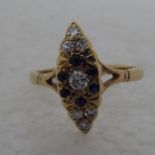 A 9ct gold marquise set sapphire and diamond ring